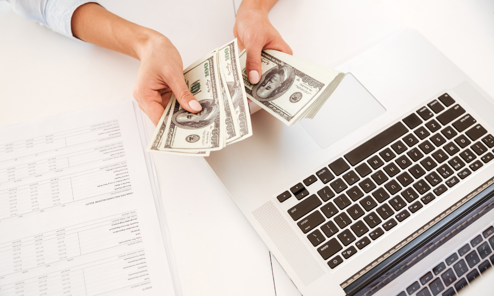 money, pricing, woman holding money